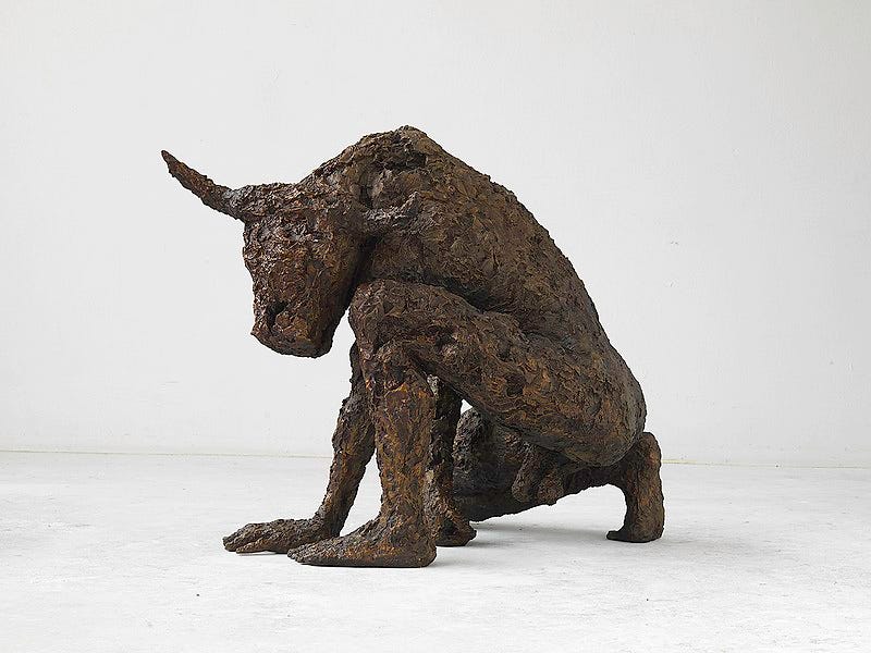 A bronze statue of the Minotaur representing ancient myths.